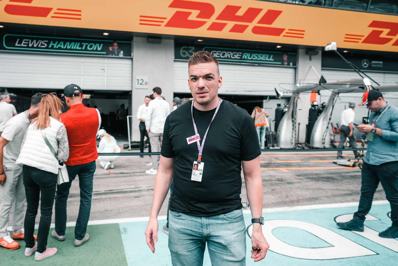 Christoffer Lindén standing in the paddock